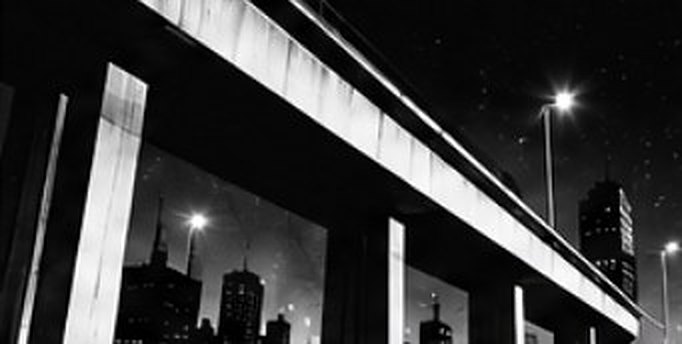 Elevated highway over the city at night